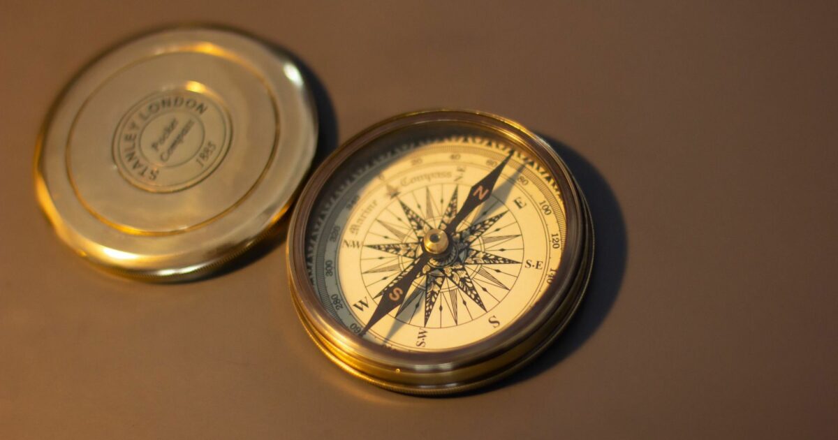 Antique Compass on a Table