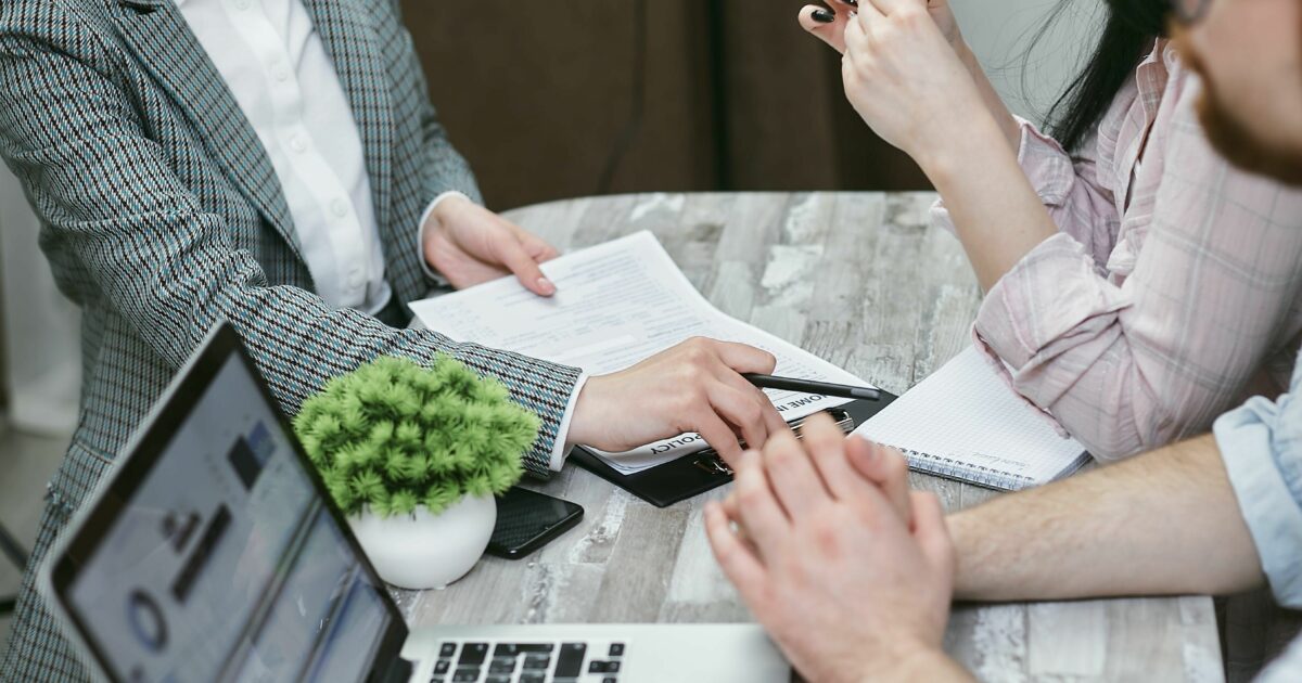 A Woman Holding a Contract