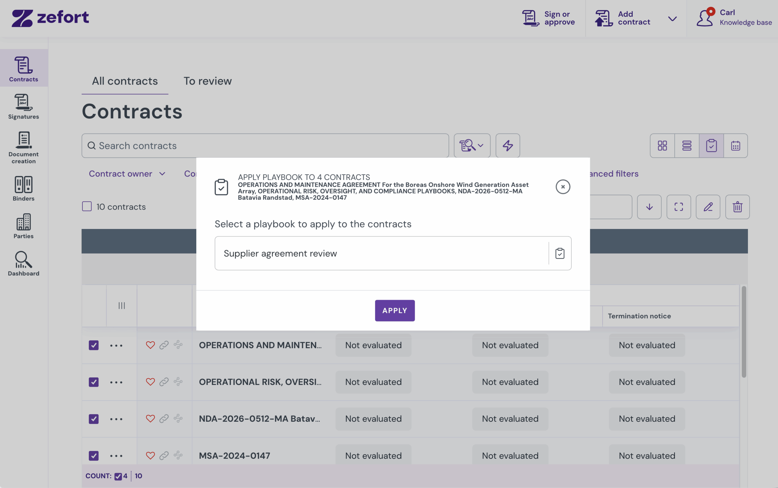 Bulk action dialog for applying a playbook to selected contracts